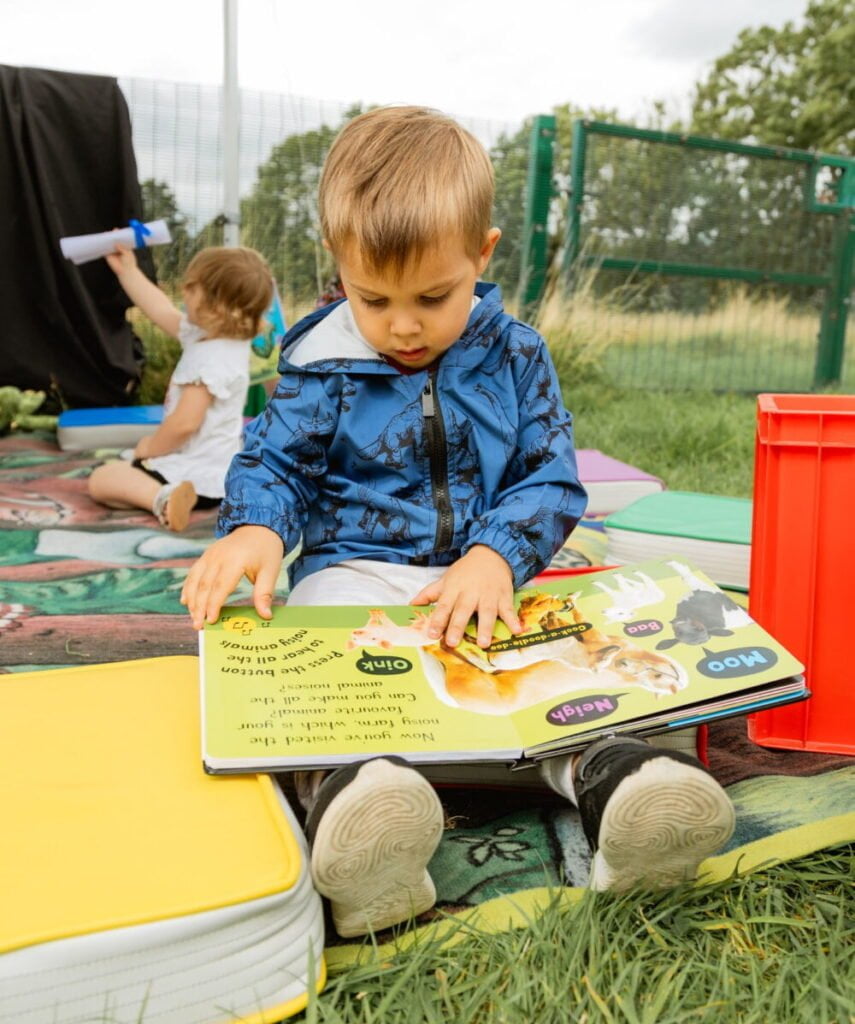 Thrive at Five What we do boy reading book